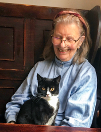 Mary Spain with one of the cats she loved